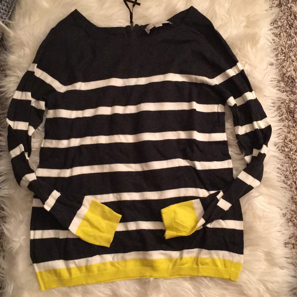 Striped sweater with zipper and pocket details!